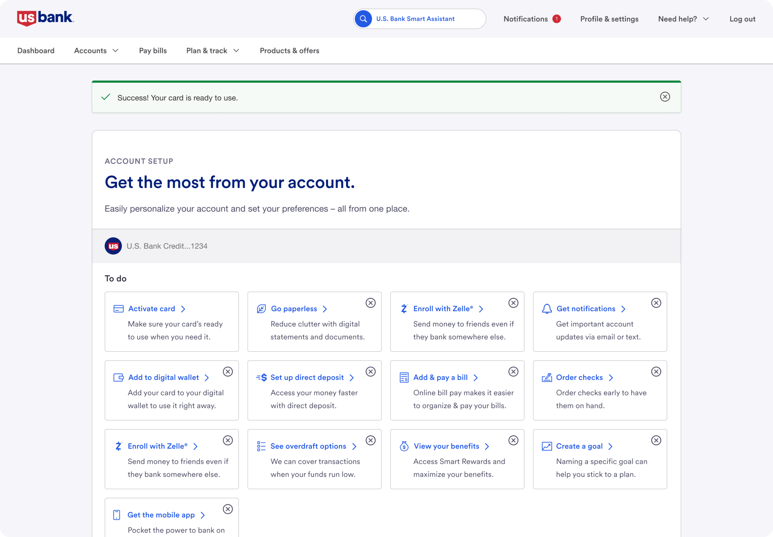 The desktop onboarding console with a success toast and a grid of setup task tiles.